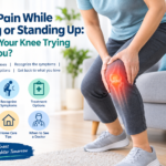 Person experiencing knee pain while standing up after sitting